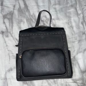 Brand new never used black pleather backpack